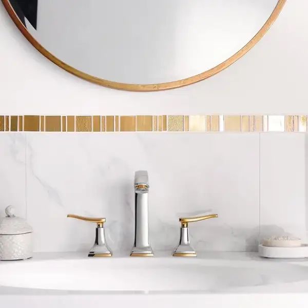 Смеситель для раковины на 3 отверстия Hansgrohe Metropol Classic (цвет - хром/золото), с донным клапаном (31331090) фото 2 Aquada.com.ua