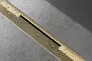 Внешняя часть трапа для душа, укорачиваемого 70 см Hansgrohe RainDrain Flex (полированное золото) 56050990