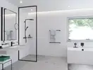Внешняя часть набора Hansgrohe Exafill S для слива и перелива с наполнением (цвет - чёрный матовый) (58117670) фото 2 Aquada.com.ua