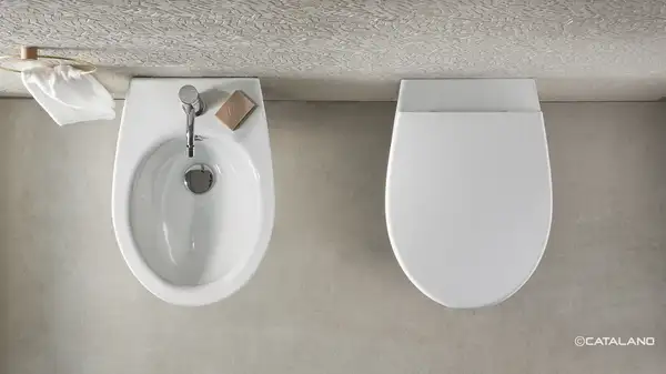 Унитаз подвесной NewFlush (безободковый) Catalano Italy с сиденьем Soft Close, белый глянцевый 1VS52RIT00+5ITSTF00