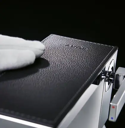 Смеситель для раковины на 3 отверстия Axor MyEdition (цвет - хром/кожа серая) (47052000+47916000) фото 2 Aquada.com.ua