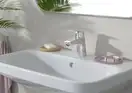 Смеситель для раковины 70 Hansgrohe Logis (цвет - хром), с металлическим сливным гарнитуром 71170000