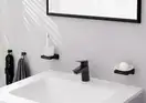 Смеситель для раковины 70 Hansgrohe Logis (цвет - чёрный матовы), с металлическим сливным гарнитуром 71170670