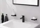 Смеситель для раковины 100 Hansgrohe Logis (цвет - чёрный матовый), с металлическим сливным гарнитуром 71171670